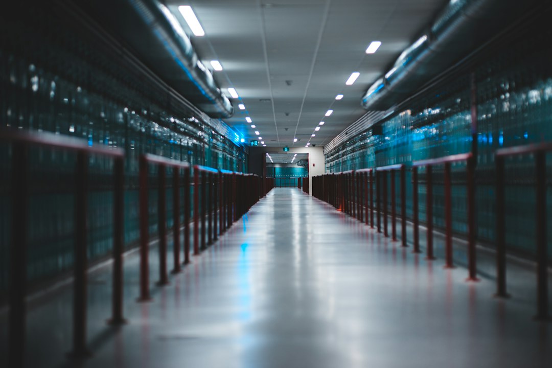 A data-centre corridor representing the physical infrastructure behind AI services.