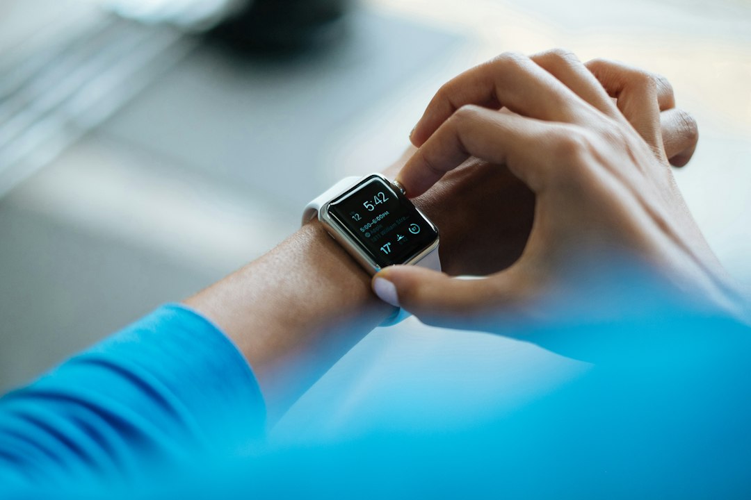 Illustrative fitness tracker for the Fitbit Edge vs Fitbit Air comparison; not an official product image.