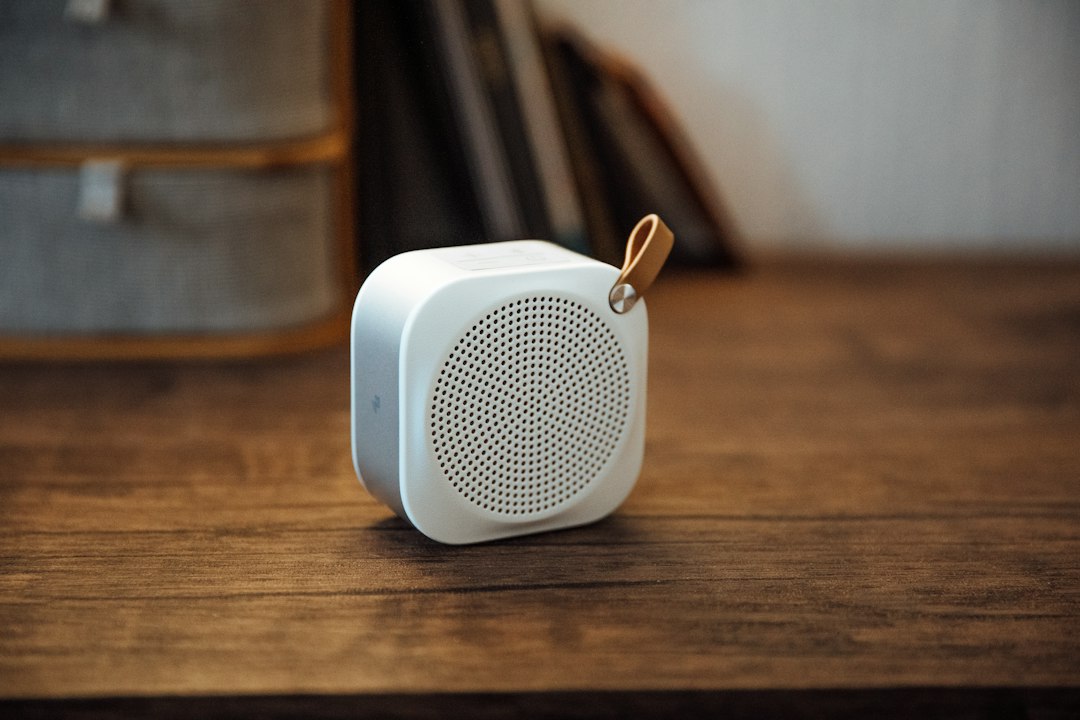 Illustrative portable speaker for the CMF Speaker S vs Speaker M comparison; not an official CMF product image.